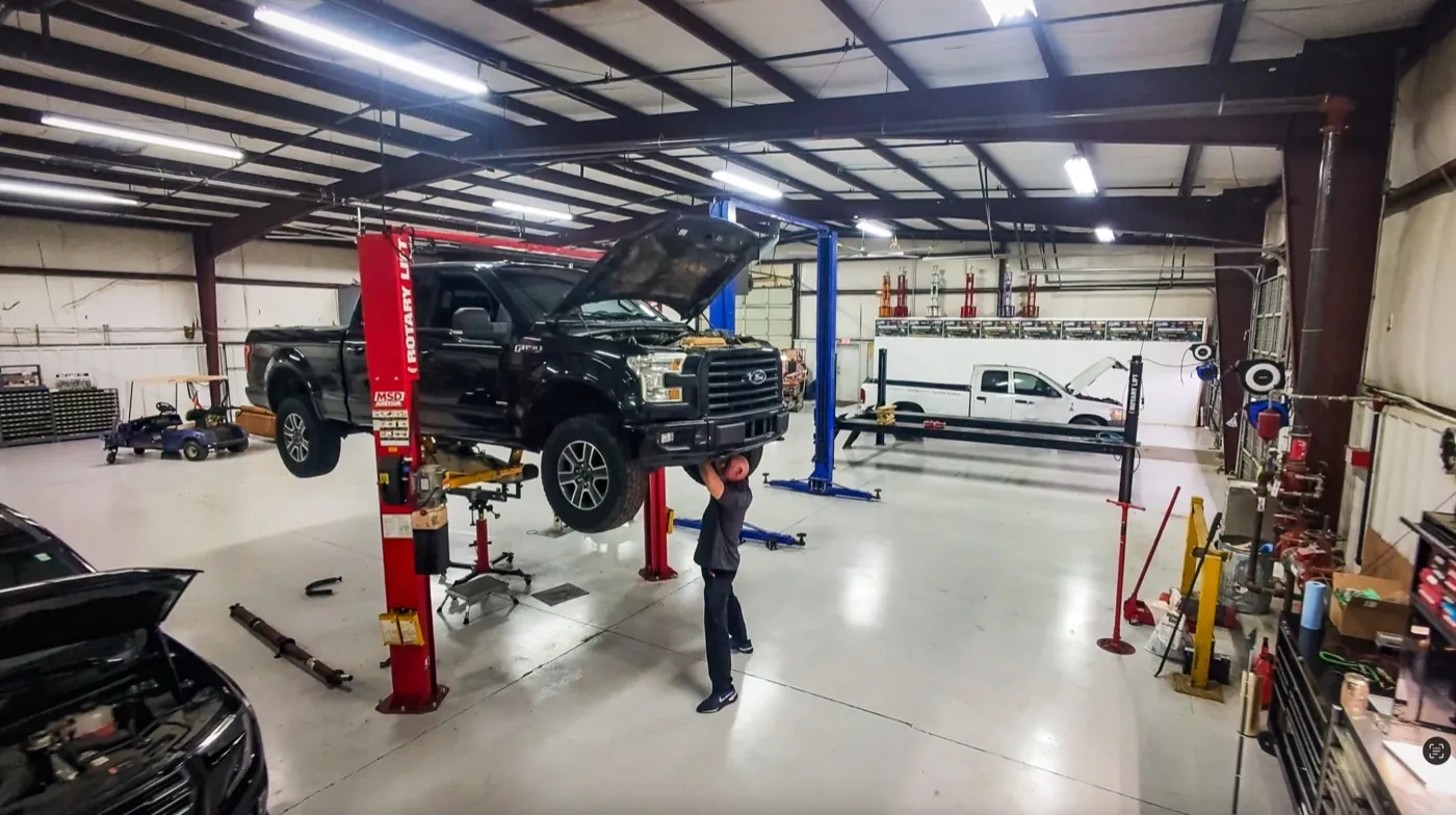 The clean Titan Auto Services shop floor in Jacksonville, AR, a short drive south of Ward