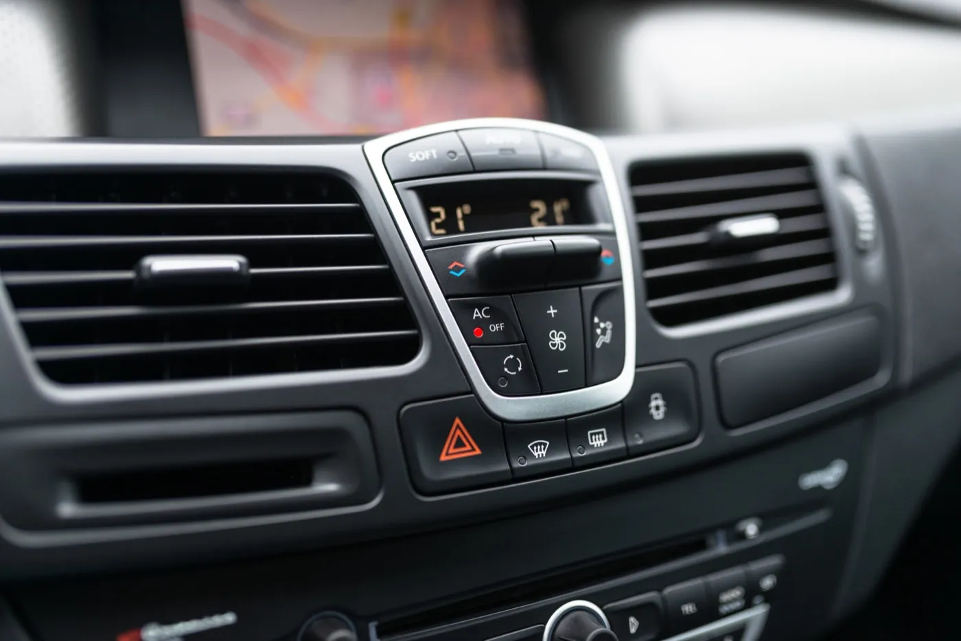 Dashboard air conditioning controls in a modern car interior