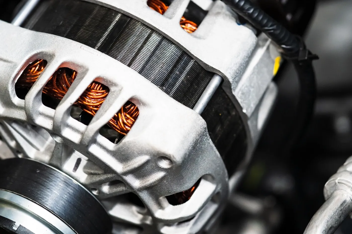 Close-up of a car alternator at Titan Auto Services